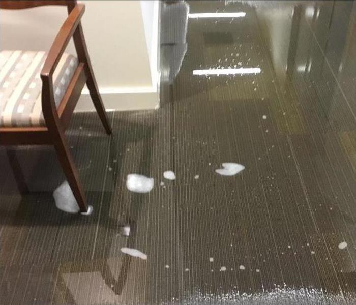 soaked carpet, flooded office building